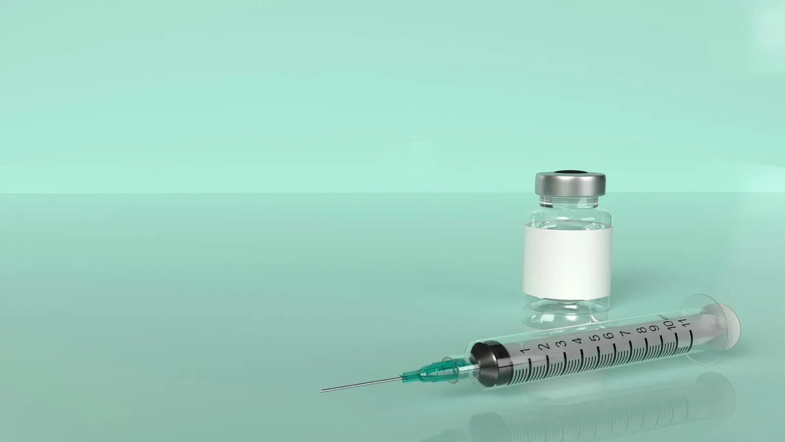 Injection vial and syringe on a clinical surface